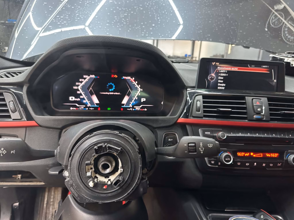 Deska rozdzielcza BMW F30 podczas wymiany zestawu wskaźników